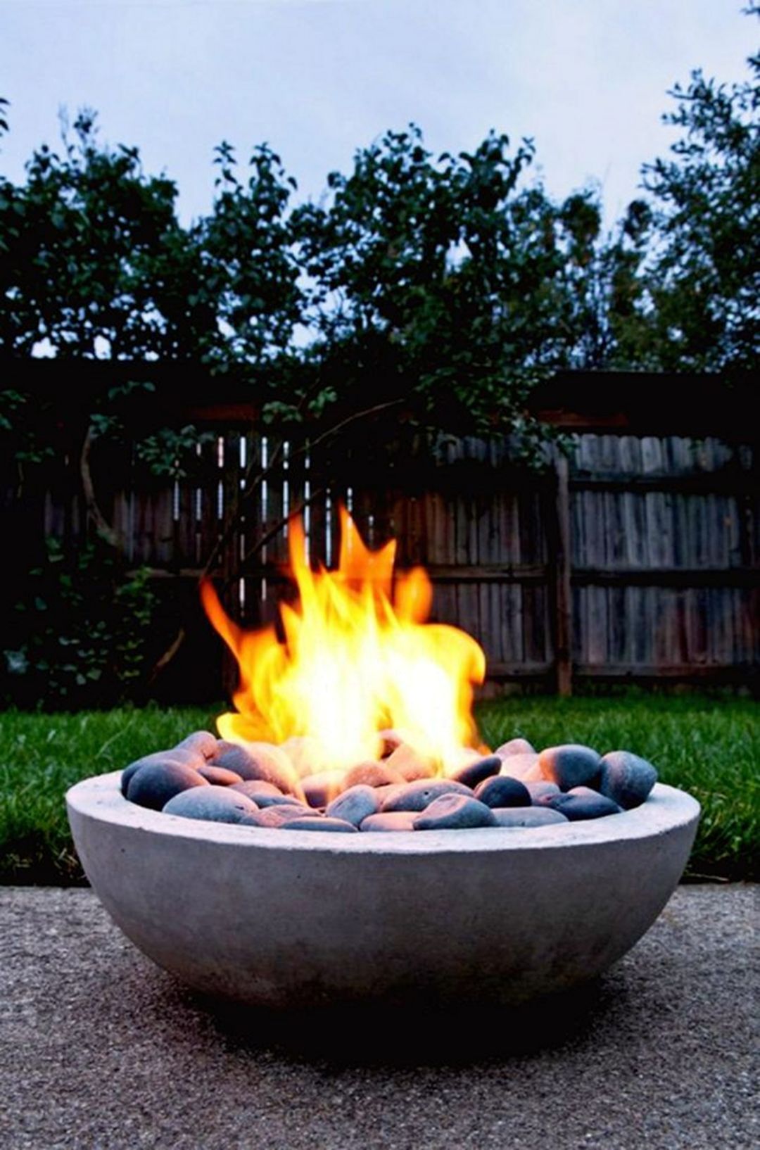 Rounded Stone Fire Pit In The Garden